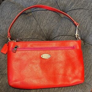 Coach Red Leather Wristlet with Pink Zip Accent and Silver Plaque